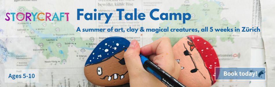 A child's hand painting faces on decorative story stones with a marker pen, with the Storycraft Fairy Tale Camp banner promoting a summer of art, clay and magical creatures in Zürich for ages 5 to 10
