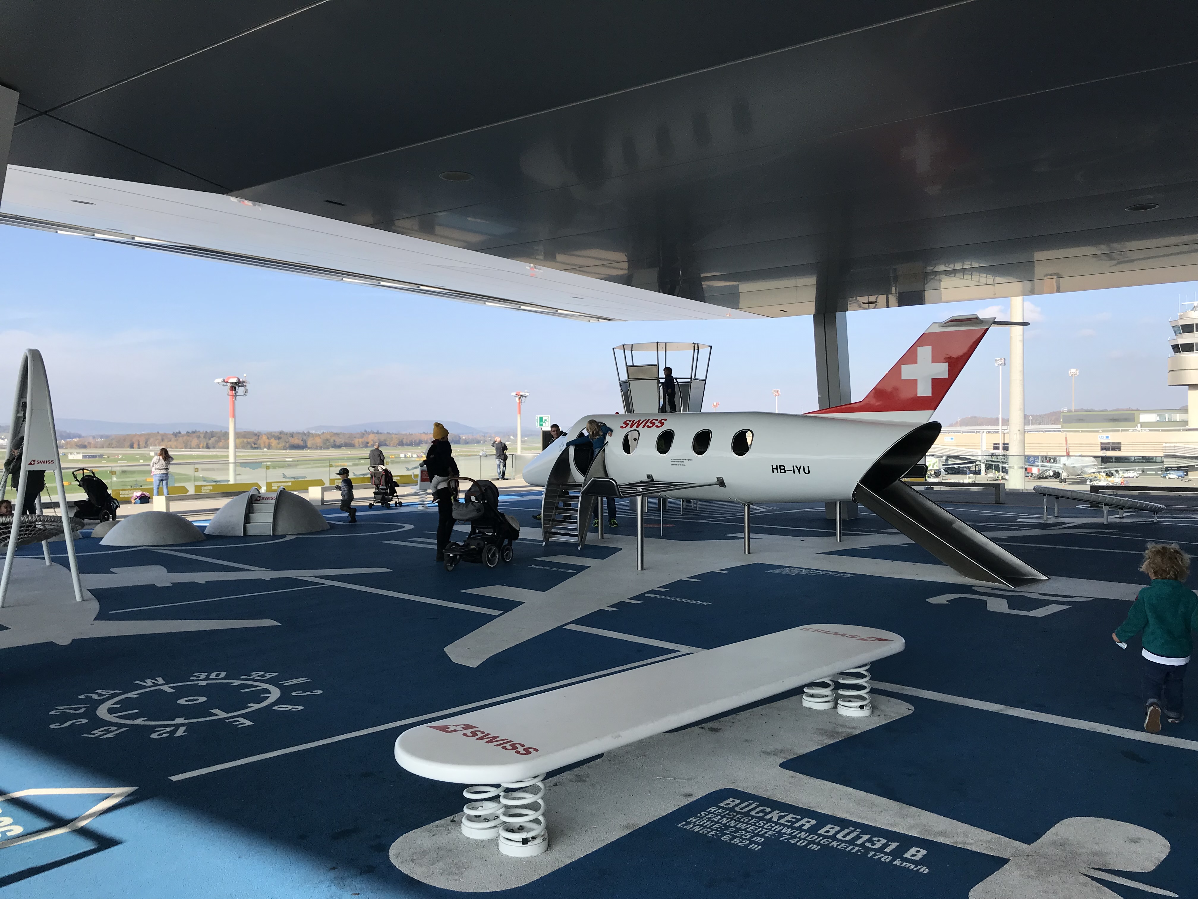 The mini airport playground, slides and seesaws at Zurich Airport Observation Deck in Gate B 