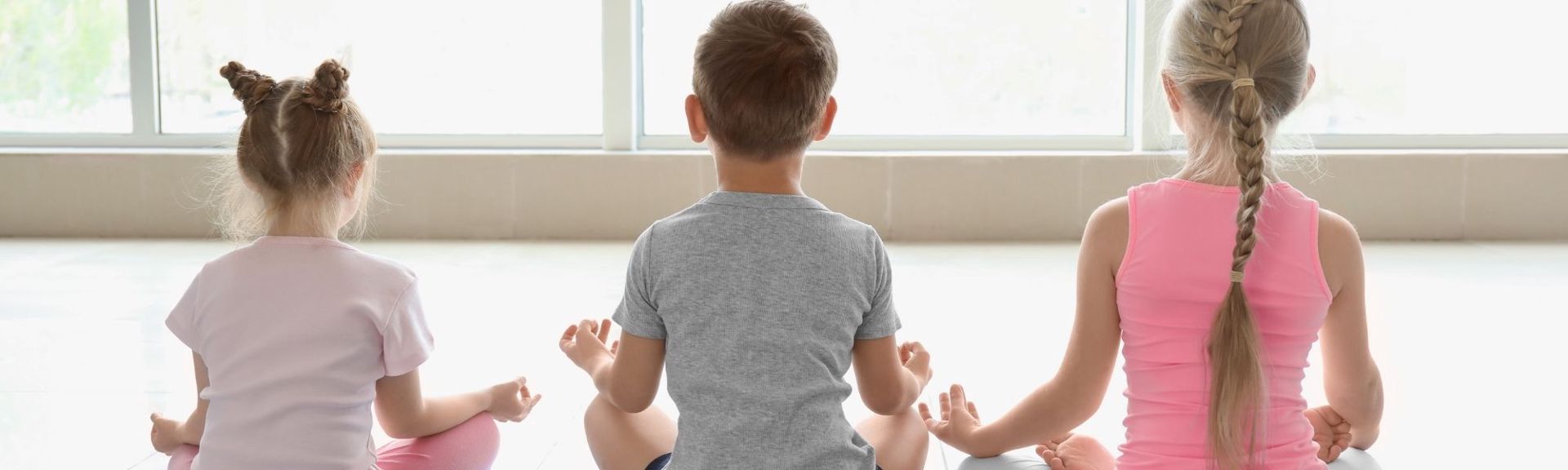 In Children's Yoga classes, kids embark on a journey of self-discovery where they connect with themselves, build self-confidence, and strengthen their bodies—all through playful activities.