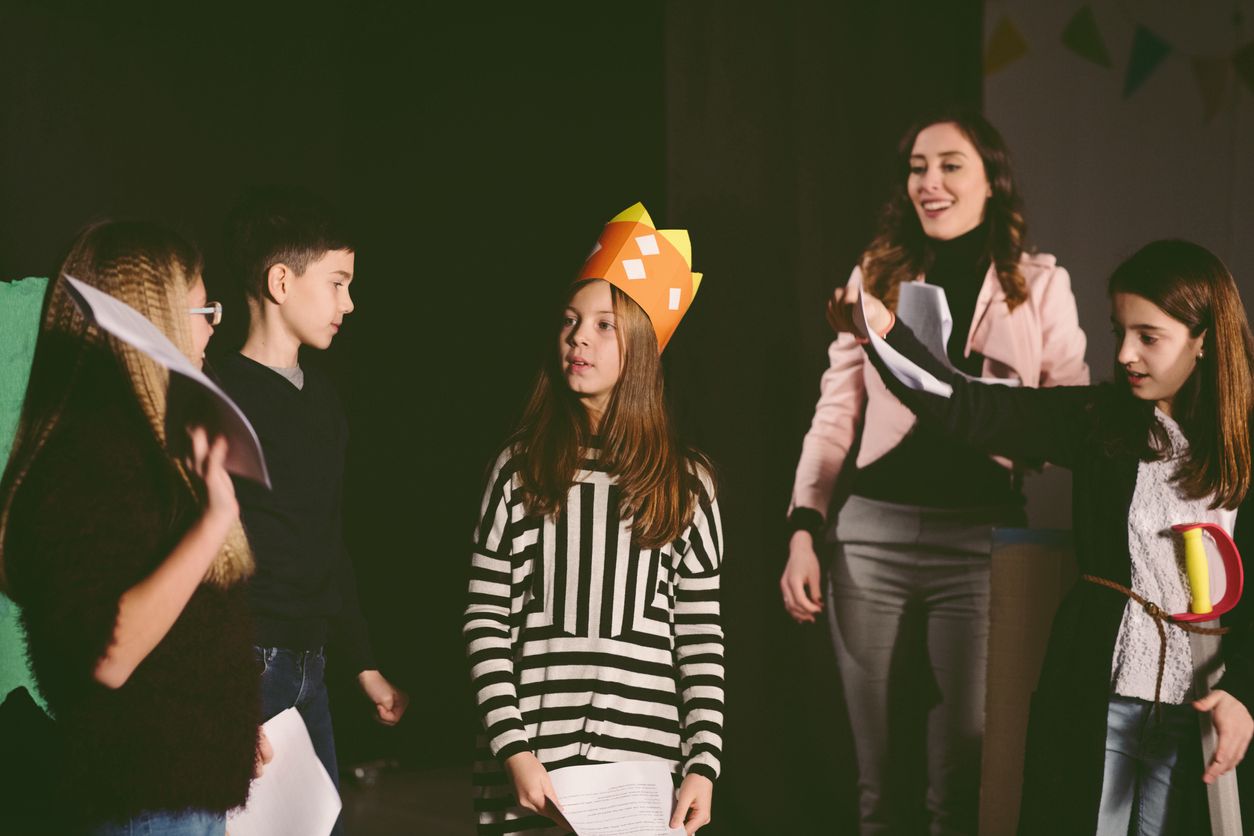 Teens rehearsing on a stage for their next play at Close Encounters Theater in Zurich