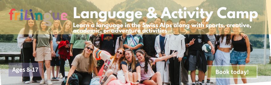 A large group of teenagers laughing and posing together outdoors in the Swiss Alps, with the friLingue Language and Activity Camp banner for ages 8 to 17