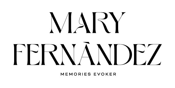 Black and White logo of Mary Fernandez, a family photographer in the Zurich region. Her objective is to evoke memories.  