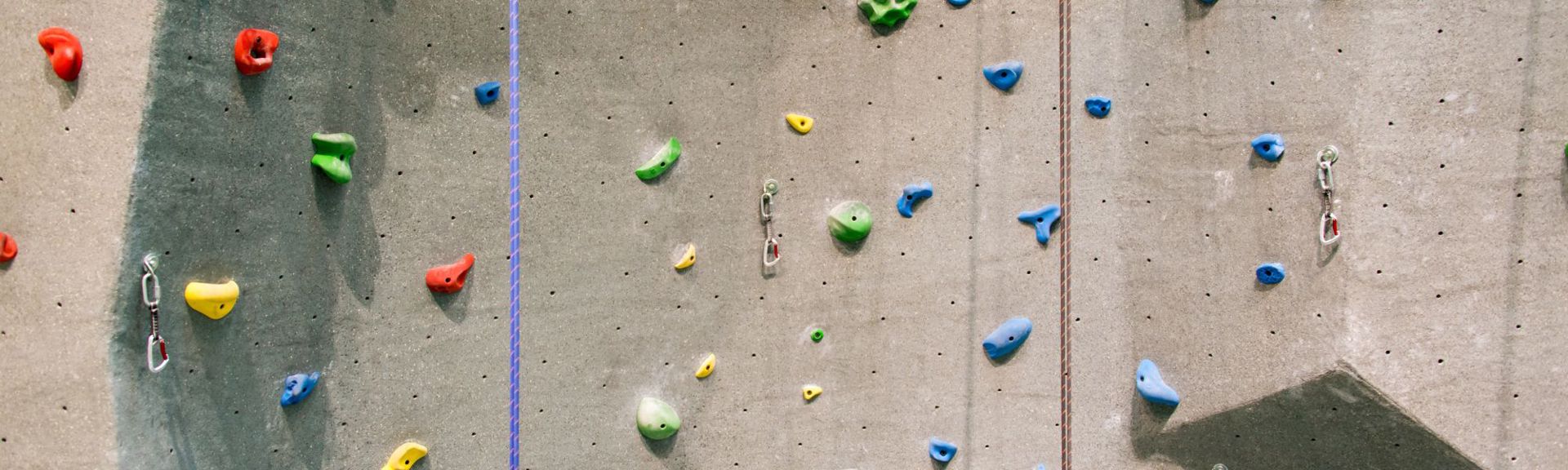 Interior of Pilatus Indoor Climbing Centre in Root, Switzerland, featuring expansive climbing walls, bouldering zones, and modern training facilities catering to climbers of all levels.