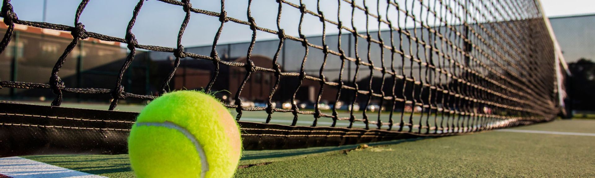 Young players practicing tennis at Tennis Center Horgen, with indoor courts, professional coaching, and a bright, well-equipped sports facility.