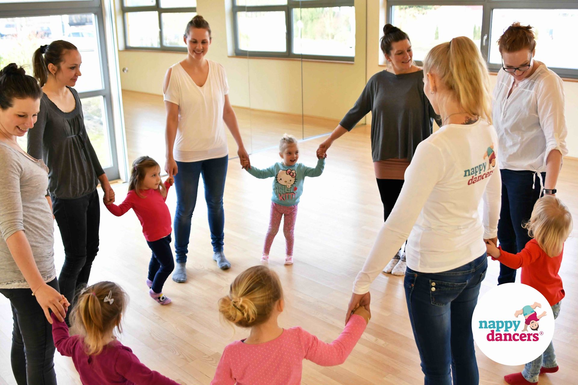 A class with toddlers and mommies at nappydancers with instructor Ivana Stubnova in Meilen, Switzerland.  