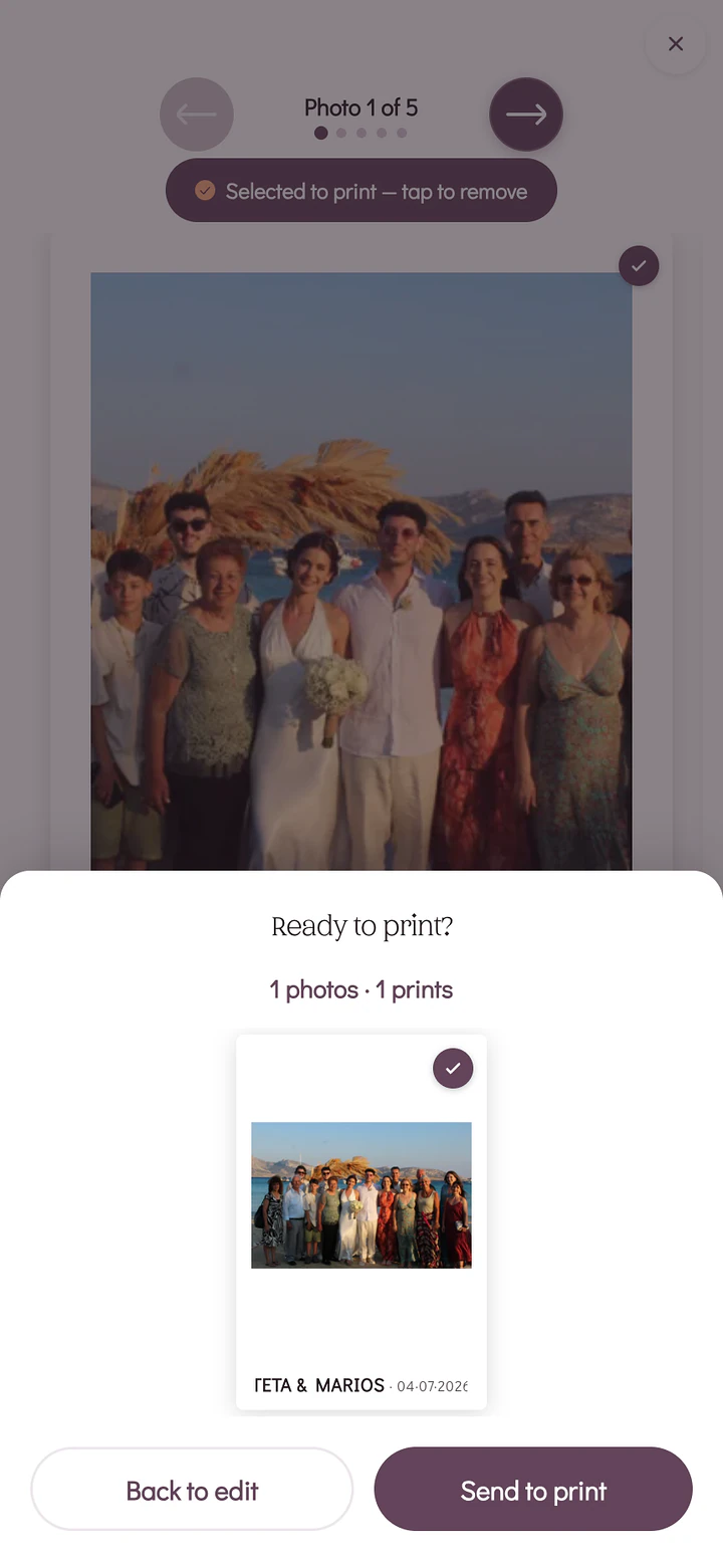 A Ready to print confirmation screen on a phone previewing the finished photo card with the couple's names beneath it