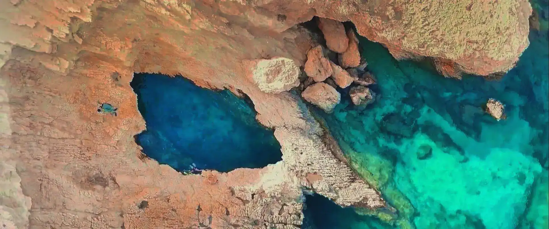 Drone view of a natural rock pool, Koufonisia