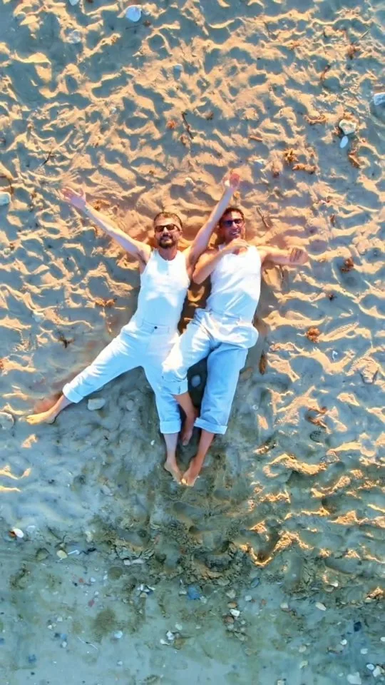 Aerial drone shot of a couple on the beach — Koufonisia wedding film
