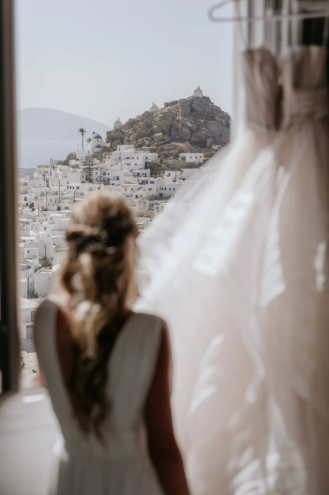 Το ξημέρωμα παστέλ ουρανού πάνω από την Ίο μετά από μια γιορτή του Ios Club