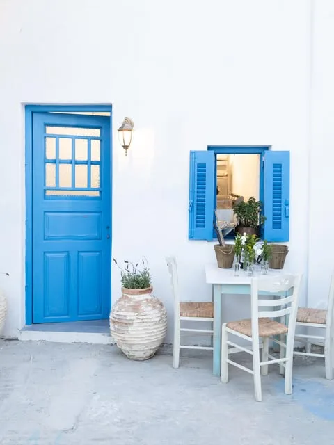 Blue door and shutters of the Stou Lolou courtyard, Chora