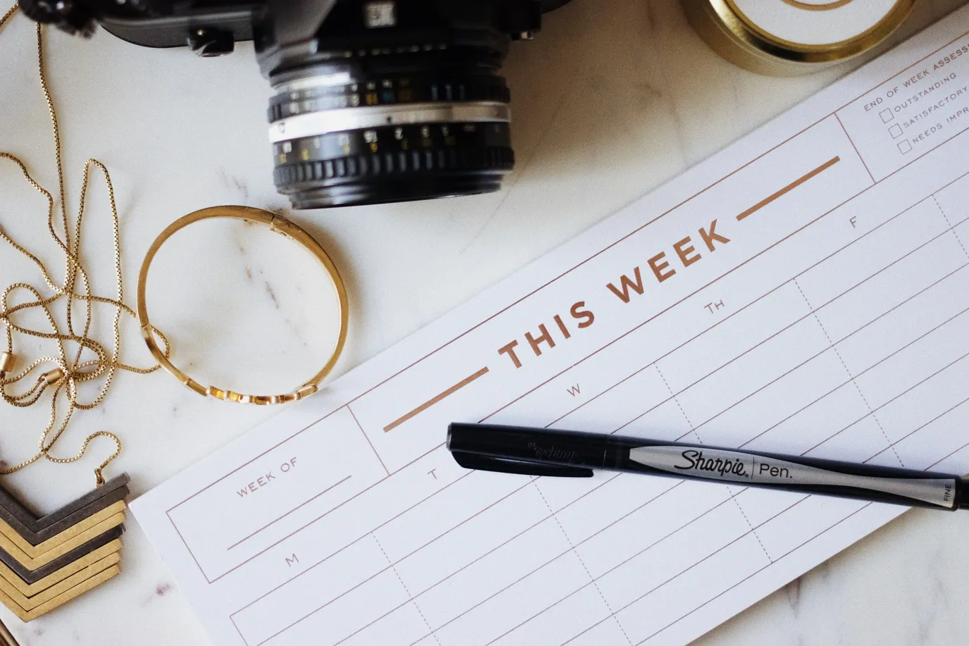 Couple planning wedding timeline with checklist and digital tools for a stress-free celebration